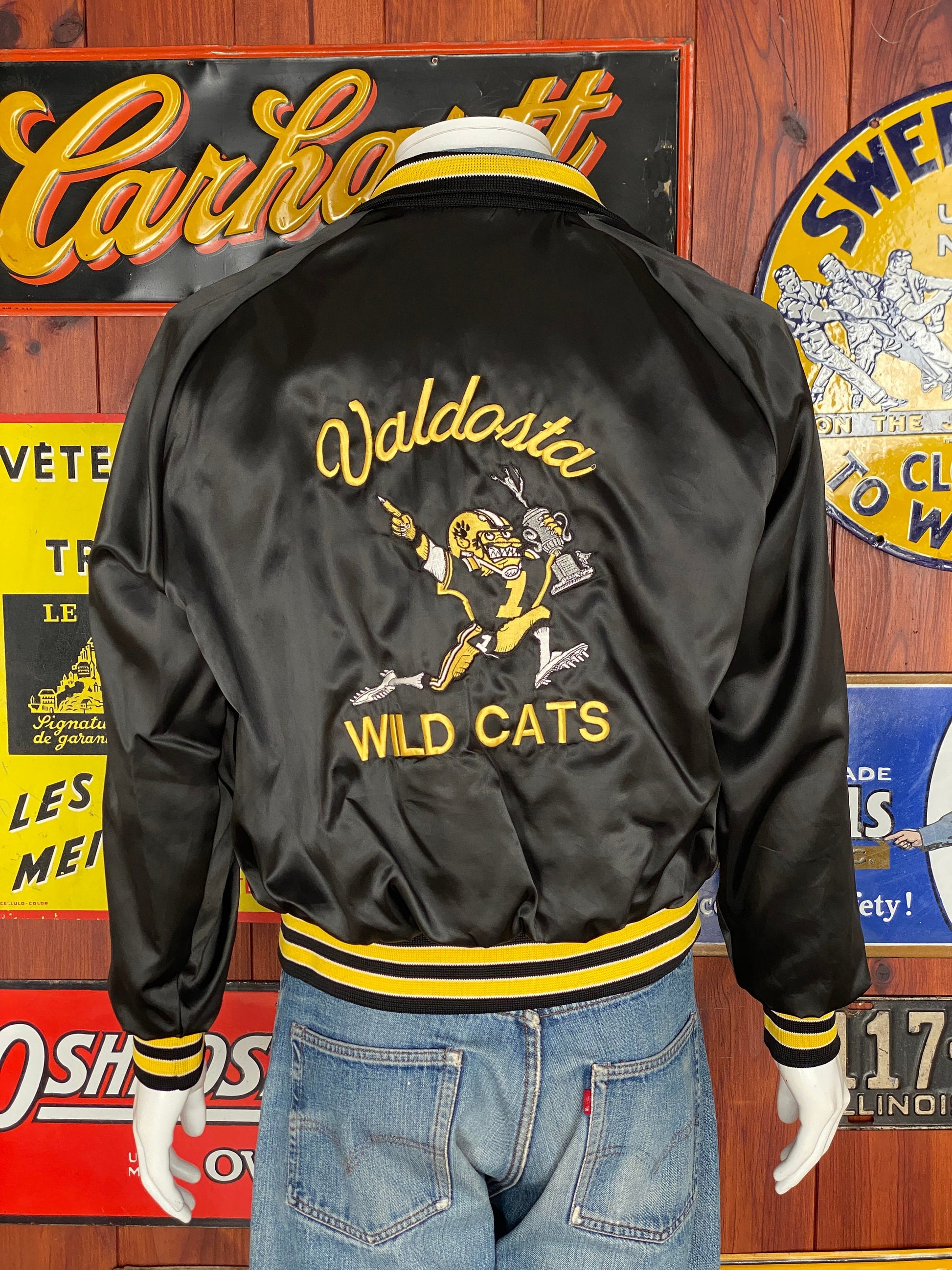 Vintage 80s football satin jacket made in USA, size medium - Retro style and durable craftsmanship for your wardrobe.