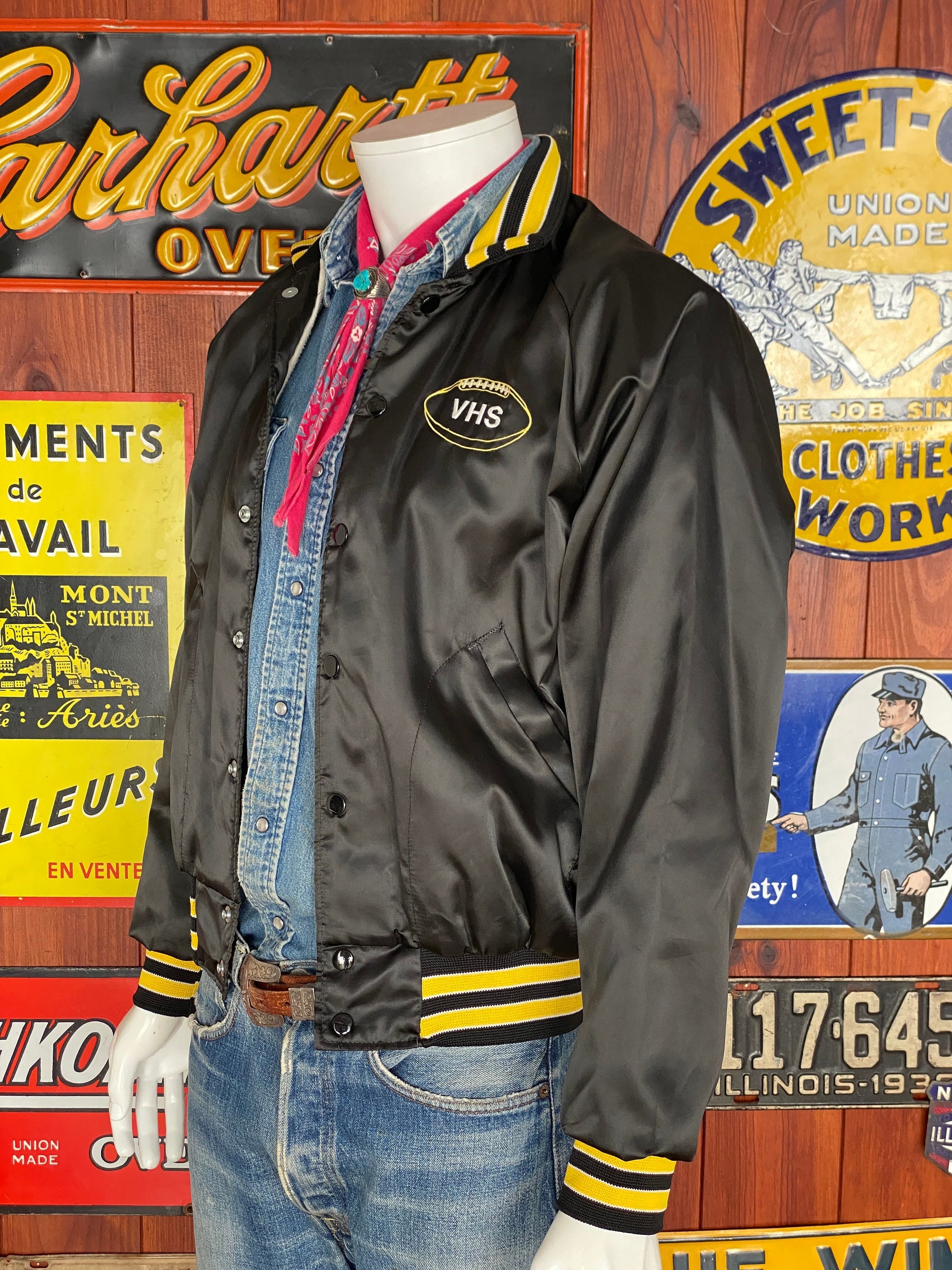 Vintage 80s football satin jacket made in USA, size medium - Retro style and durable craftsmanship for your wardrobe.