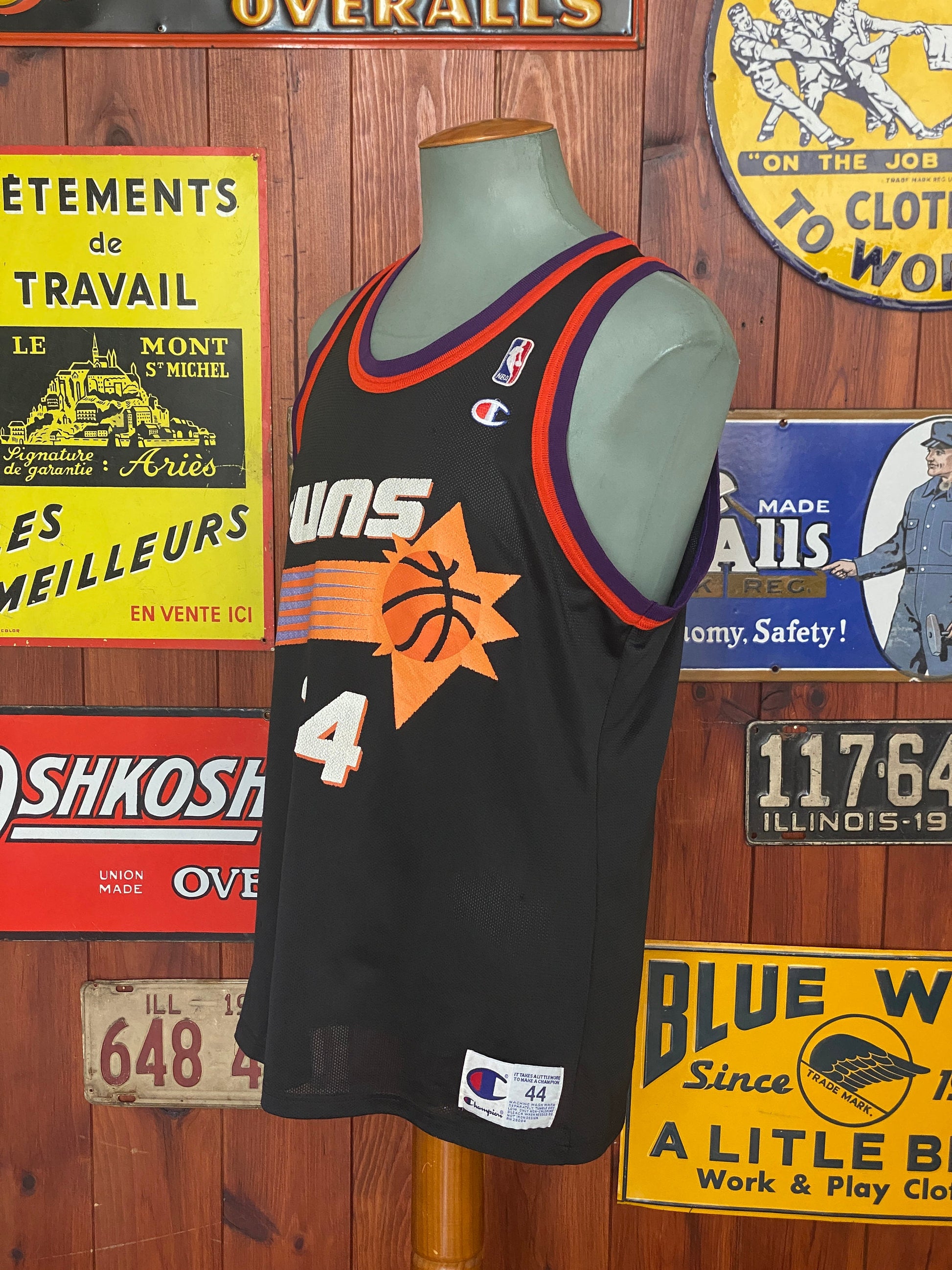 Vintage 90s NBA Phoenix Suns Charles Barkley #34 jersey, size 44 - front view. Made by Champion.